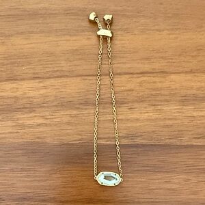 Kendra Scott “Elaina” gold adjustable bracelet.